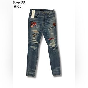AMIRI Distressed Blue Denim with assorted patches & badges